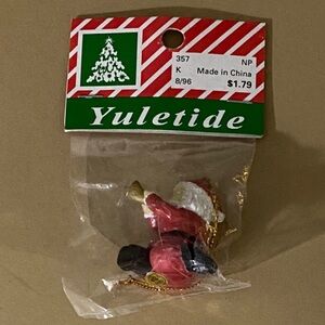 Yuletide, Vintage 1996 Sitting Santa Claus with Horn  Ceramic Painted Ornament